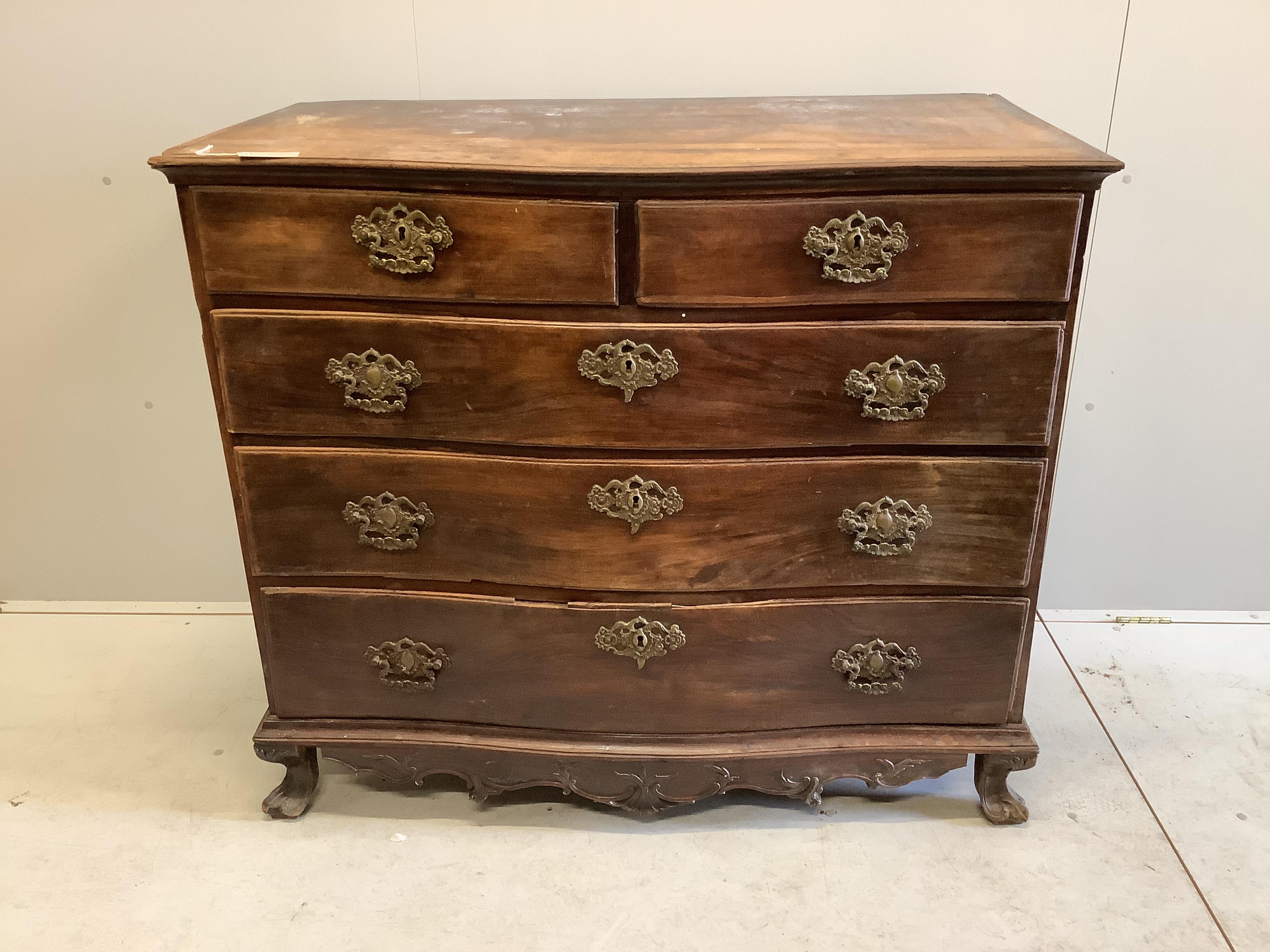 An 18th century Continental rosewood serpentine four drawer chest (missing back foot), width 120cm, depth 62cm, height 103cm